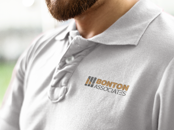 Bonton Associates employee wearing company polo shirt